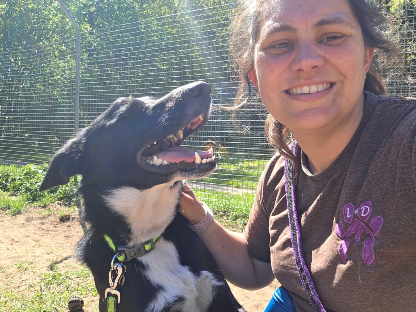 Danielle spending relaxed one to one time with a happy dog
